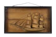 A model of a clipper ship diorama in timber & glass case