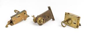 Three ships brass door locks, 19th century
