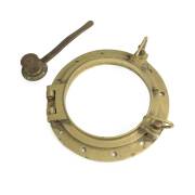 A solid brass ship's porthole and yacht's brass handle