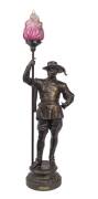 A bronzed figured lamp "HALLEBARDIER LOUIS XIII"