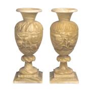 A pair of carved alabaster urns, 19th century
