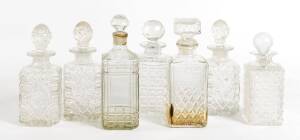 Seven assorted crystal and glass decanters