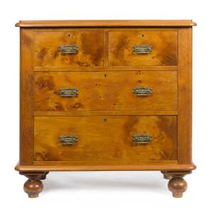 A chest of 4 drawers with heavily figured birdseye huon pine drawer fronts on turned bun feet, huon pine secondary timbers, circa 1880