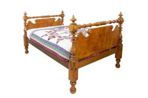 A solid birdseye huon pine three quarter bed, circa 1840