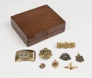 Military group including pre WW1 New South Wales belt buckle, badges, locket, brooch, stripes and cedar box