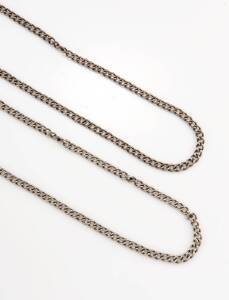 Two silver chains, of curblink design. Weight 123 grams. Length 74cm (each).