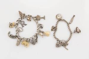 Two silver charm bracelets, of curblink design, hung with various charms and heart padlock.