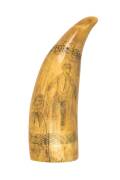 A scrimshaw whale's tooth engraved with man and child