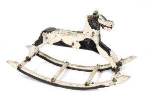 A folk art rocking horse, hand painted Eucalypt and metal with rubber tyre blade protectors, early