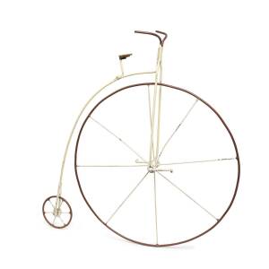 A miniture folk art penny farthing bike, painted metal, late 19th century