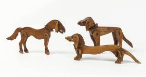 Three folk art jointed dogs, early 20th century