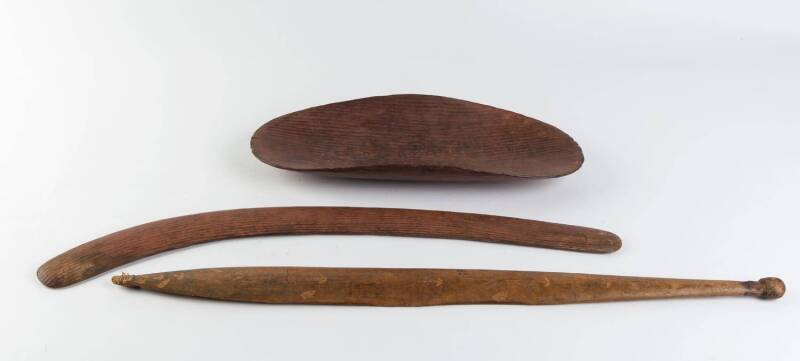 Aboriginal artifacts, boomerang, woomera & coolamon