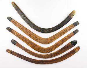 A group of five boomerangs from the Hermannsburg Mission, carved in Latin, French and English, possibly protest statements, one signed "Aboriginal Boomerang Sword of Emperor of Oceania The S.A. N.T. Artist No. 1 Namatjiria" 