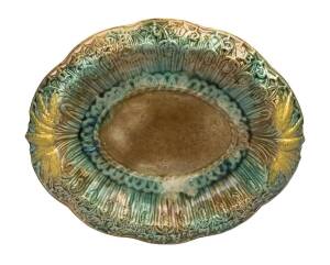 An oval Australian pottery bread plate, late 19th century