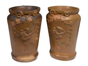 ADELAIDE POTTERY Pair of garden urns with applied koalas and floral decoration 