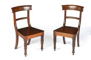 A pair of spade back hall chairs, cedar, mid 19th century