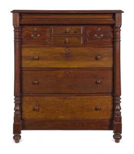 A chest of 8 drawers with turned columns, circa 1860