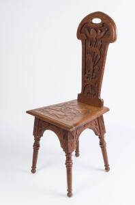 An Australian carved oak hall chair monogrammed "N.O"