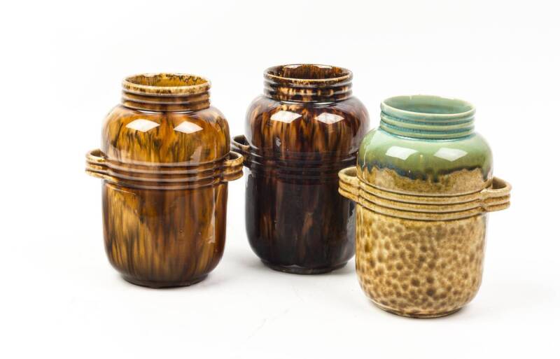 BENDIGO POTTERY Three Rockingham and green glazed vases