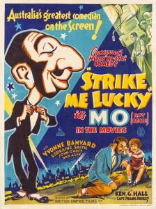 c1934 movie poster, "STRIKE ME LUCKY" (1934) starring Mo (Roy Rene), directed by Ken G.Hall, photographed by Frank Hurley, colour lithograph printed by W.E.Smith Sydney, framed & glazed, overall 85x105cm.