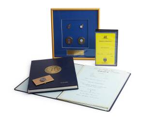 America's Cup 1851-1983 business card holder engraved Alan Bond Australia II, three VHS videos, framed medallions 'Sydney 2000 Olympic Countdown', two copies of limited edition America's Cup bopok 1851-1983 by John Rousmanieve, no. 10 and 524 of 2,000 and