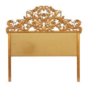 A kingsize carved floral scroll gilt wood bed head