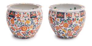 A pair of Chinese polychrome floral fish bowls