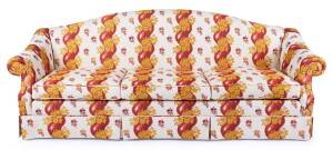 A three seater sofa&nbsp;upholstered fabric with&nbsp;red solomnic columns with gold vine