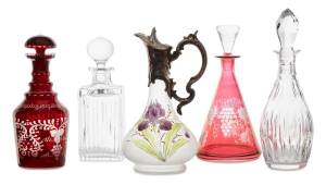 A silver plate mounted enamelled claret jug and eight various decanters