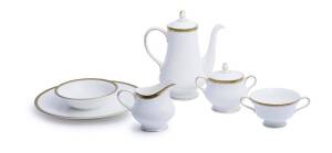 A Wedgwood Chester pattern&nbsp;dinner and tea service, with green and gilt rims including a coffee pot, milk jug, sugar bowl, cups and saucers and various plates&nbsp;