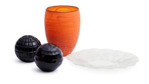 A collection of Art glass comprising 2 black balls, an orange vase, & a glass sea charger