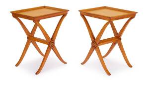 A pair of cross framed wooden side tables