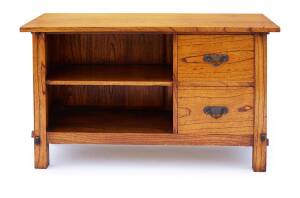 An Arts and Crafts style elm side table