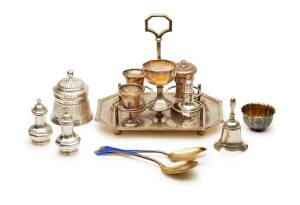 A collection of silver comprising a sterling silver cruet frame, Sheffield 1984and a pair of pepper casters, a single caster, a small goblet, a silver plate dinner bell, a Bulgari bowl, two French goblets, a silver box and a two enamel Scandinavian spoons