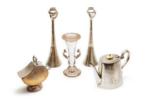 A collection of silver comprising a sterling silver trumpet vase with female caryatid handles, London 1910, 20 cm high,&nbsp;a silver plate teapot, a sugar skuttle and a pair of modern candlesticks