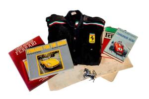 FERRARI: Collection with Ferrari jacket, "prancing horse" car badge, flag, magazines, books (14) including "Ferraris For The Road" by Rasmussen [Wisconsin, 1980]; plus Ben's drafting film & blueprint SC1488 for his redesign of the Ferrari 365BB clutch-pla