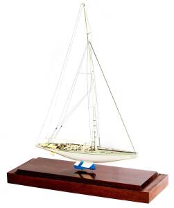"AUSTRALIA II KA 6", superb GRP scale model with stainless steel rigging, built by Costello Ship Model Company of New York from ben Lexcen's plans, on wooden stand 85x28cm, 100cm tall. Minor faults.