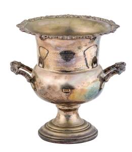 Silver-plated Trophy Cup, 28cm tall, with "Ampol" badge, engraved "Ben Lexcen, Designer Australia II, Joint Winner 1982-1983, Ampol Yachtsman of the Year Award, For the Most Outstanding Contribution to Yachting in Australia. Australia II, Winner the Ameri