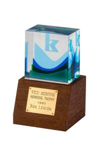TROPHY, with plaque engraved "Ted Kenyon Memorial Trophy, 1983, Ben Lexcen", 23cm tall. Awarded by Kenyon Marine (USA) to the individual who has contributed the most to advance pleasure, sail or power boating.
