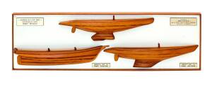 THREE AMERICA'S CUP YACHTS: Presntation display with three half models mounted on board - America's Cup 1983, Australia II Aust, Designer - Ben Lexcen; America 1851 US, Designer - George Steers; Liberty 1983 US, Designer - Johan Valentijn, together with p