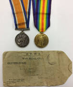 MEDALS: AUSTRALIA, WWI pair, BWM & Victory, impressed '18631 A-SJT  W.R. AMES. 2 F. AMB. A.I.F.' plus the original addressed 'O.H.M.S / WAR MEDAL ONLY' linen-lined envelope.