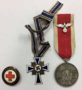 MEDALS: GERMANY, Social Welfare Medal (38mm) silvered zinc, plus Red Cross Helpers badge, (some enamel chips).