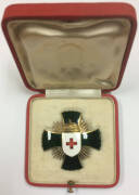 MEDALS: HUNGARY, 1922 Order of Merit Red Cross medal, rev. 'CRUX RUBRA / HUNGARICA 1922' enamelled and gold gilt in original case, very good condition. Awarded by the Hungarian government in acknowledgement for relief work undertaken after World War I.