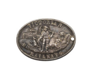 AUSTRALIA, VICTORIA Silver Railway Pass (oval 35mm x 24.5mm), 'FREE PASS' / [crown] / 'NOT TRANSFERABLE' engraved 'H. Creswick Esq. M.L.A', obv. 'VICTORIAN / RAILWAYS' prospector with pick and shovel, kangaroo left, ram right in front of  train crossing v
