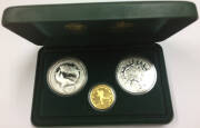 ONE HUNDRED DOLLARS:&nbsp;'The Sydney 2000 Olympic Silver Coin Collection' (#1625) cased set comprising gold $100 'Dedication - Athlete (1)' 10.021g 99.99% plus silver $5 'Great White Shark' and 'Sea Change (1)' each 31.6g 99.9%.&nbsp;