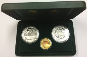 ONE HUNDRED DOLLARS: 'The Sydney 2000 Olympic Silver Coin Collection' (#1493) cased set comprising gold $100 'Achievement' 10.021g 99.99% plus silver $5 'Harbour of Life - Air' and 'Kookaburra and Waratah' each 31.6g 99.9%. 