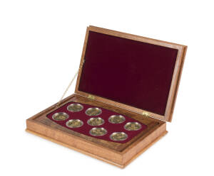 ONE HUNDRED AND FIFTY DOLLARS: $150 'Floral Emblems of Australia' full set of nine ½oz 24ct (99.9%) encapsulated gold coins in quality rosewood presentation box with cardboard outer, numbered certificates for each coin included, 4½oz agw.