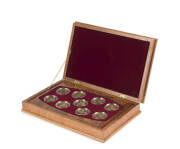 ONE HUNDRED AND FIFTY DOLLARS: $150 'Floral Emblems of Australia'&nbsp;full set of nine &frac12;oz 24ct (99.9%) encapsulated gold coins in quality rosewood presentation box with cardboard outer, numbered certificates for each coin included, 4&frac12;oz agw.