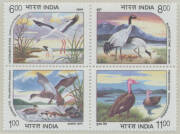 BIRDS: India 1994 Water Birds setenant block of 4 SG 1603a, unmounted; and a similar block on 1995 registered airmail cover to Singapore, repaired tear at upper-left well clear of the stamps. (4 + cover)