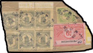 RAILWAY STAMPS: Parcel piece with remarkable combination franking of South Australian 'VR' 1d (defective), 3d pair (defective) & 3d marginal block of 4 with 'AYS SA RAILWAYS' imprint + Victorian Railways 6d on parcel piece & all cancelled. An extraordinar